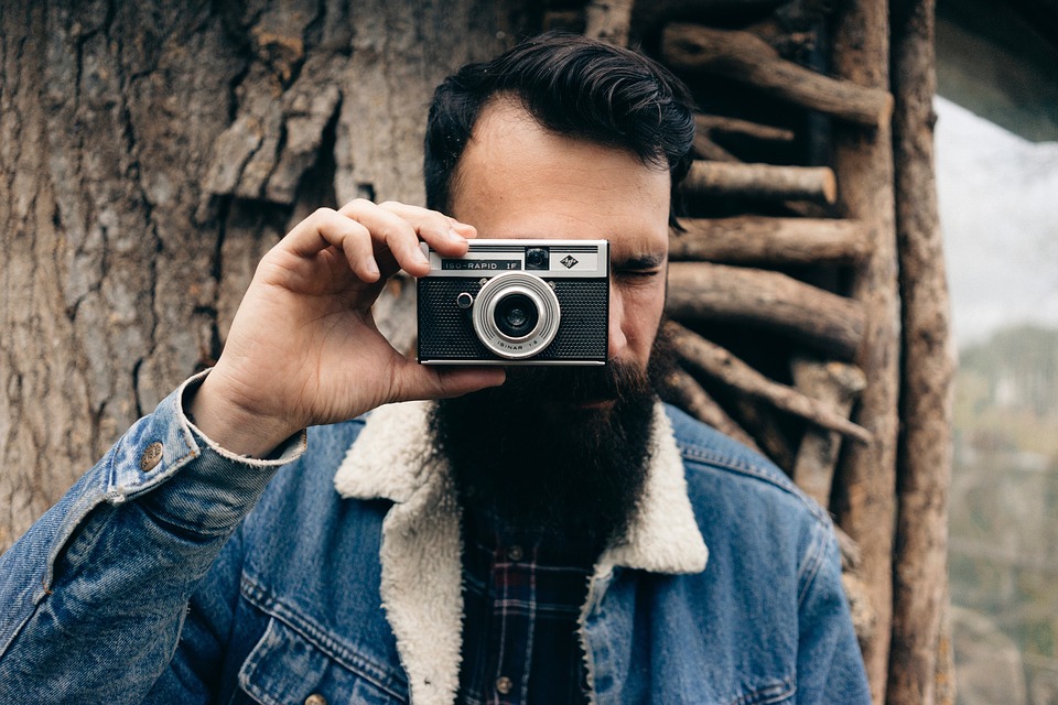 man using camera