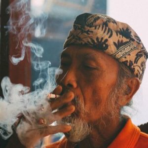 man smoking tobacco